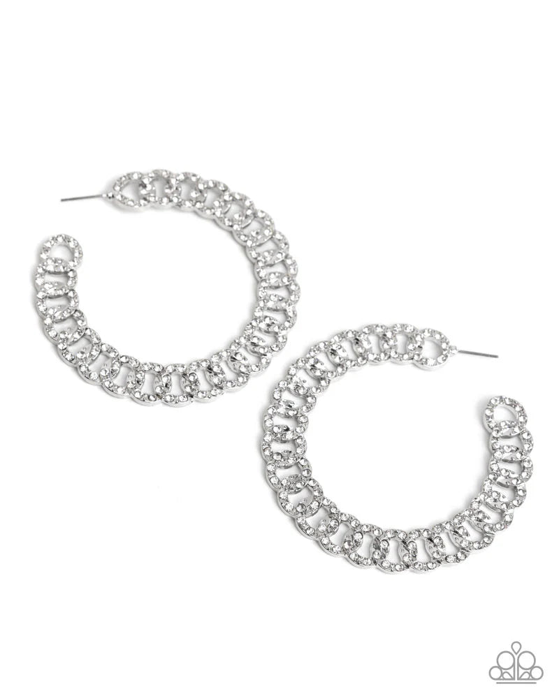 Interlocked Icing - White Rhinestone Silver Link 2 1/2 Inch Hoop Earrings August 2025 Life Of The Party Paparazzi