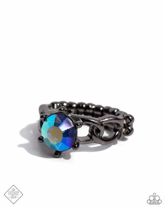 Paparazzi Authoritative Ability - Blue Iridescent Gem Gunmetal Ring Magnificent Musings Fashion Fix June 2024 R1276