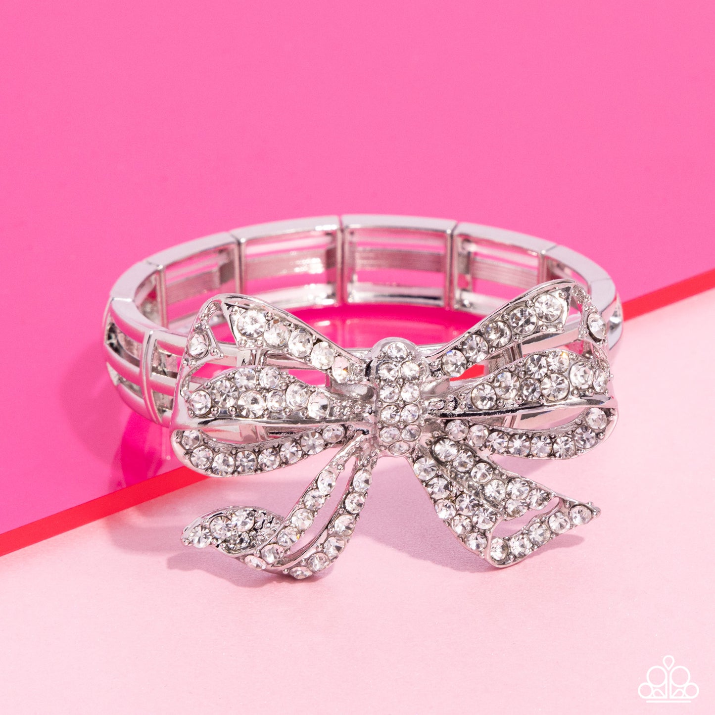 It's All A BOW To Me - White Rhinestone Silver Oversized Bow Stretch Bracelet Life Of The Party May 2024 Paparazzi B1577