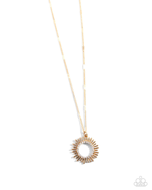 Sunburst Surprise - Gold Sunburst White Rhinestone Pendant Necklace - Paparazzi N2781