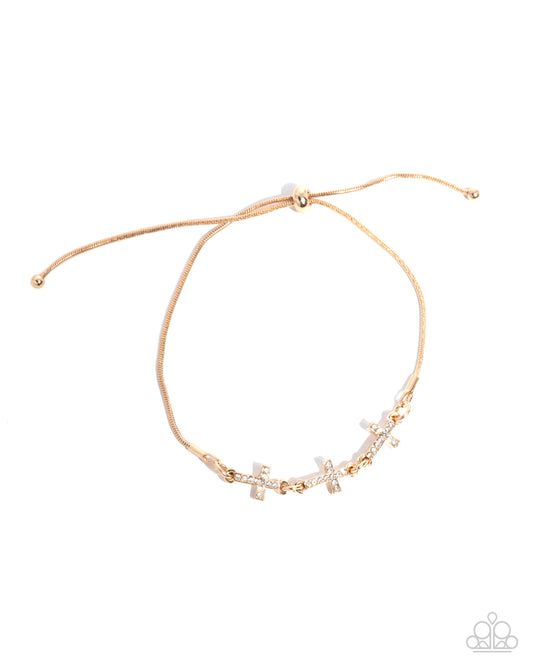 Holy Order - Gold & White Rhinestone Cross Sliding Bead Closure Bracelet Paparazzi B2297