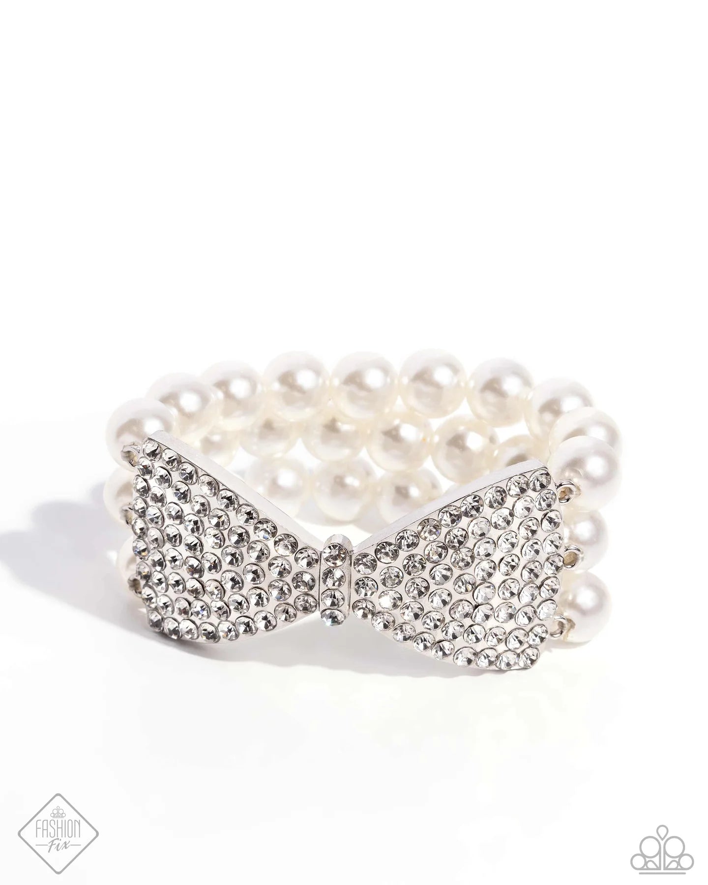 Dashing Demeanor - White Rhinestone Silver Bow Pearl Stretch Bracelet Fiercely 5th Avenue Fashion Fix August 2024 Paparazzi B2412