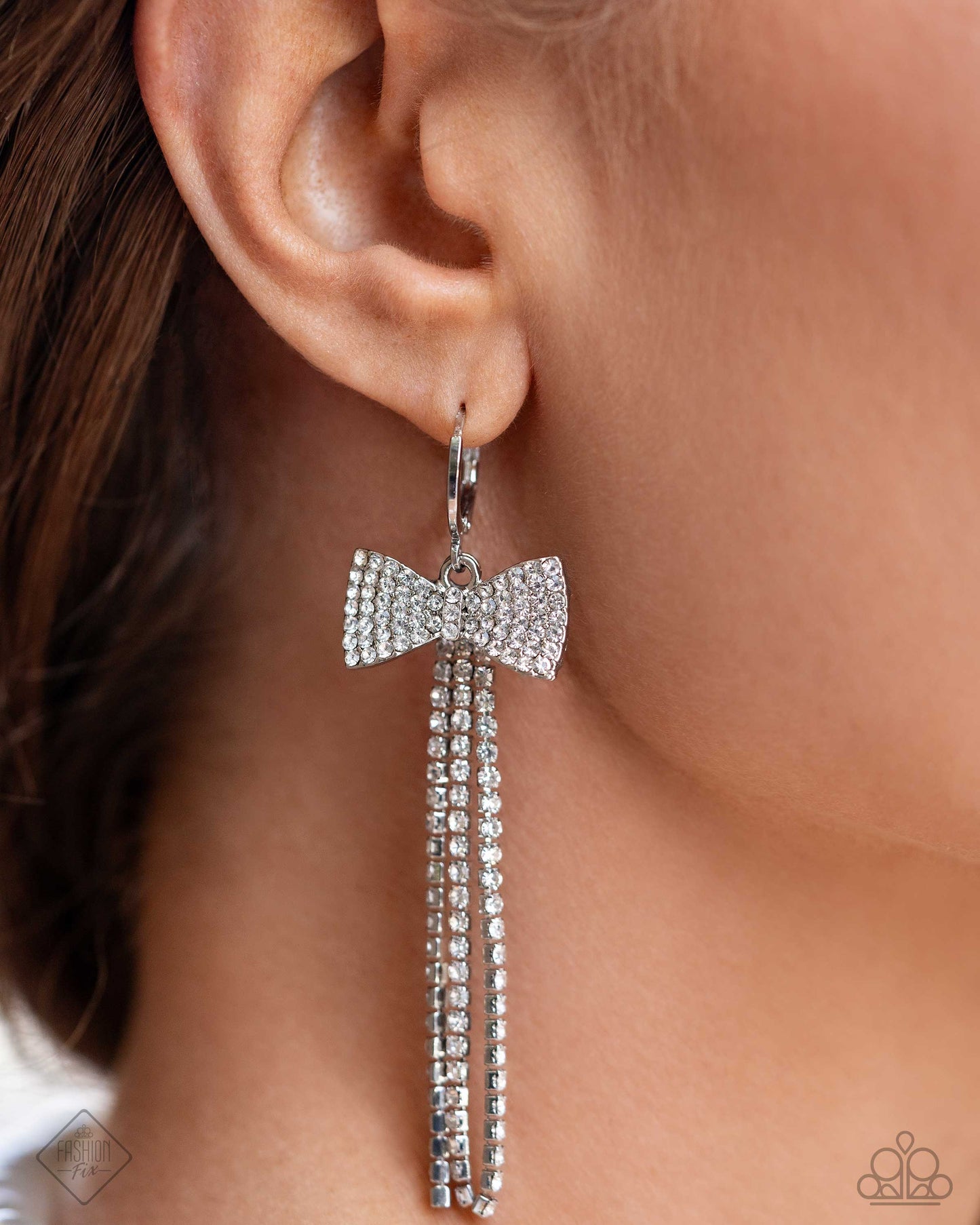 Dashing Daydream - White Rhinestone Bow Charm Earring Fiercely 5th Avenue Fashion Fix August 2024 Paparazzi E3104