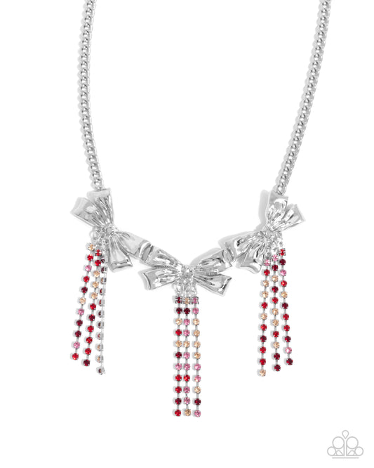 Victorian Influence - Red Light Siam, Rose, Light Peach Rhinestone Silver Bow Necklace Paparazzi N2774