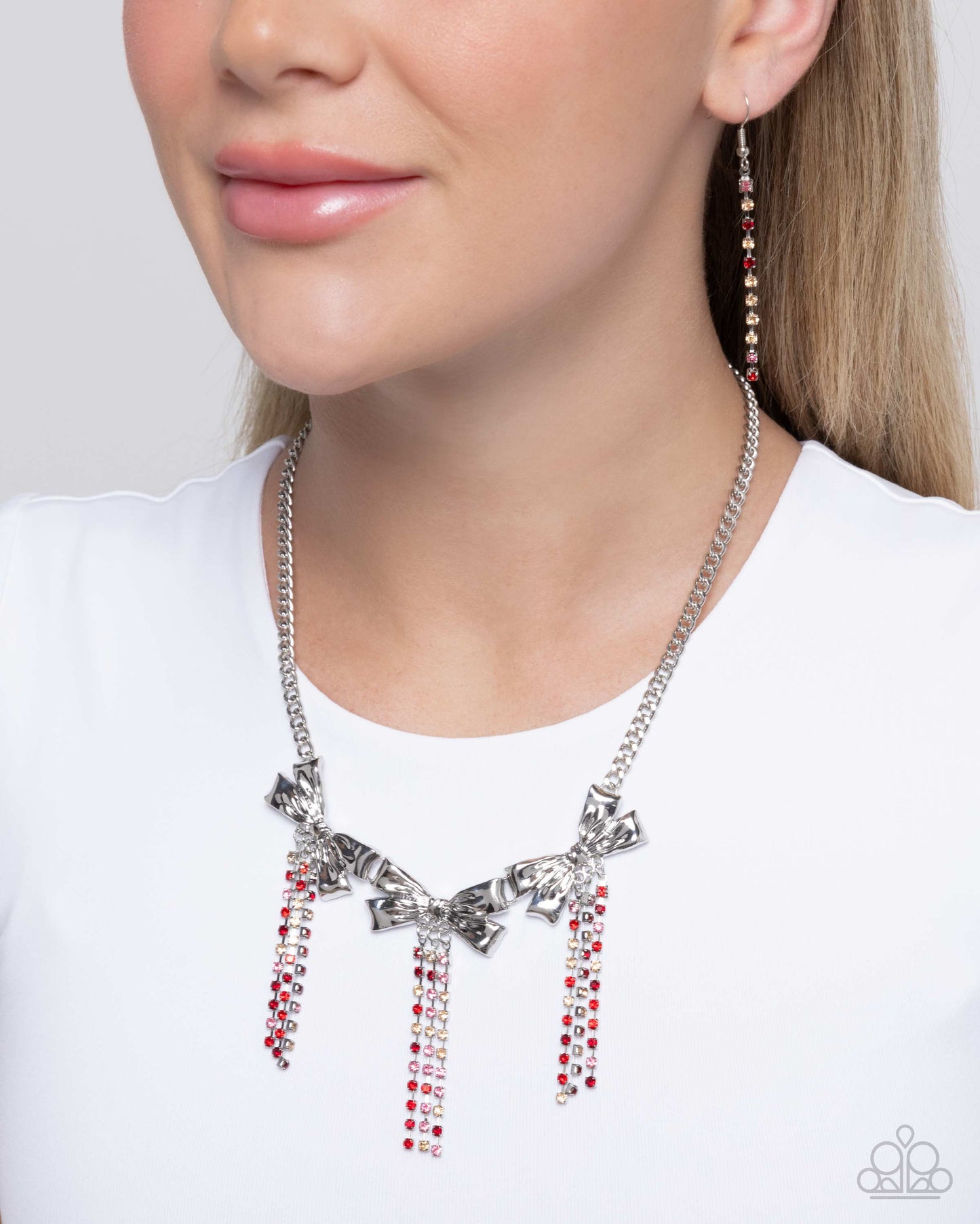 Victorian Influence - Red Light Siam, Rose, Light Peach Rhinestone Silver Bow Necklace Paparazzi N2774