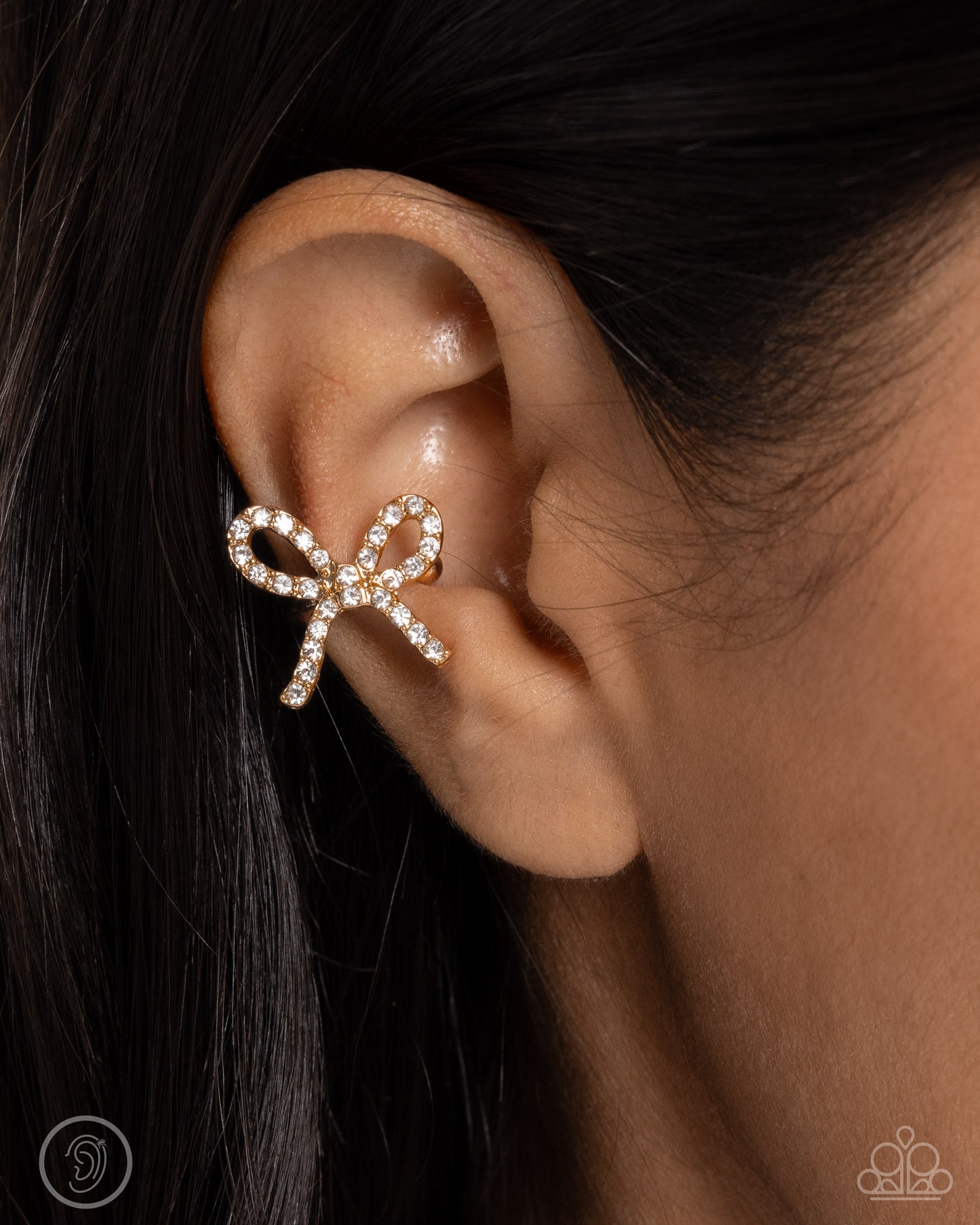 Convincing Charm - Gold Bow Ear Cuff Earring Paparazzi E2616