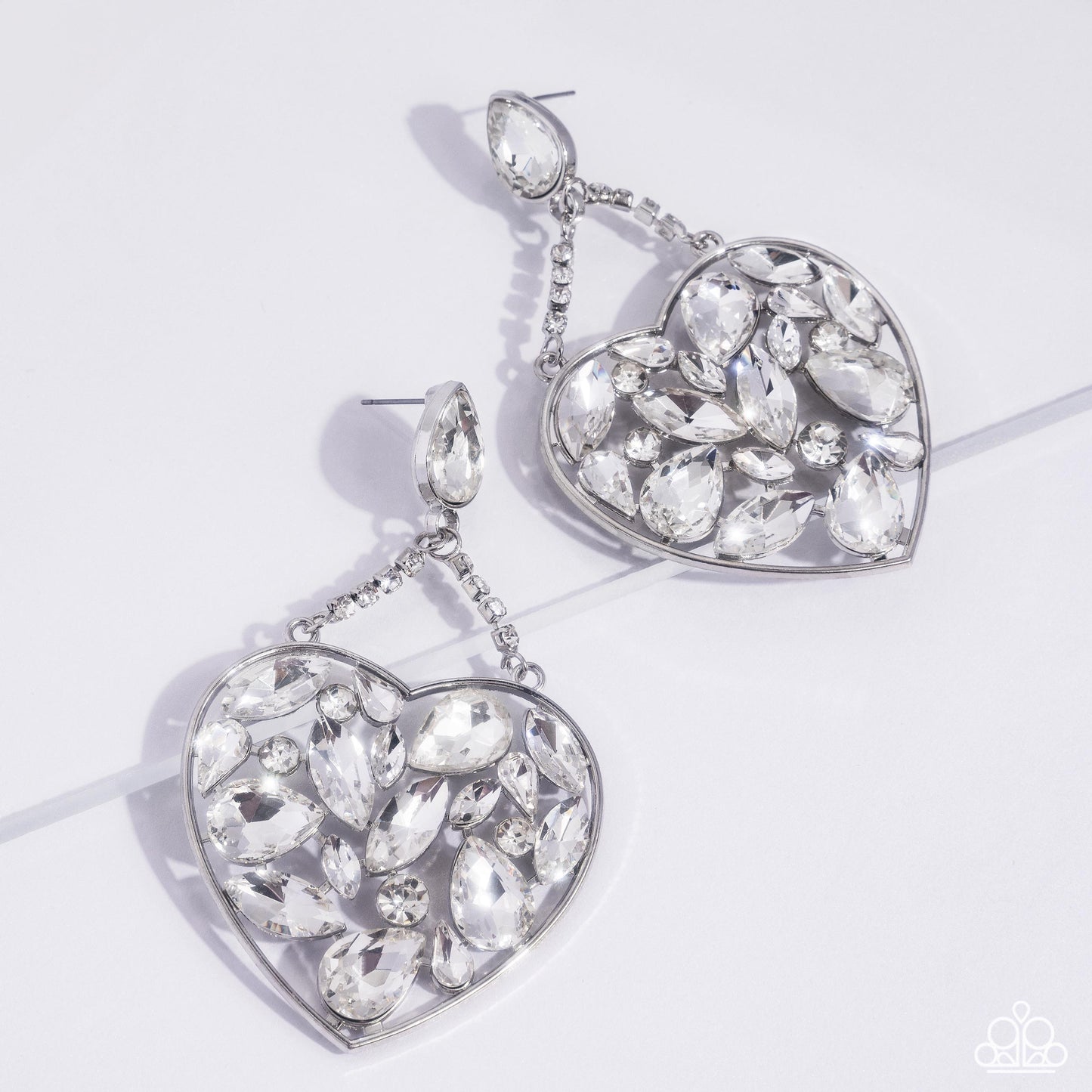 Glittery Gait - White Rhinestone & Gem Oversize Silver Heart Earring Life Of The Party November 2024 Paparazzi E2424