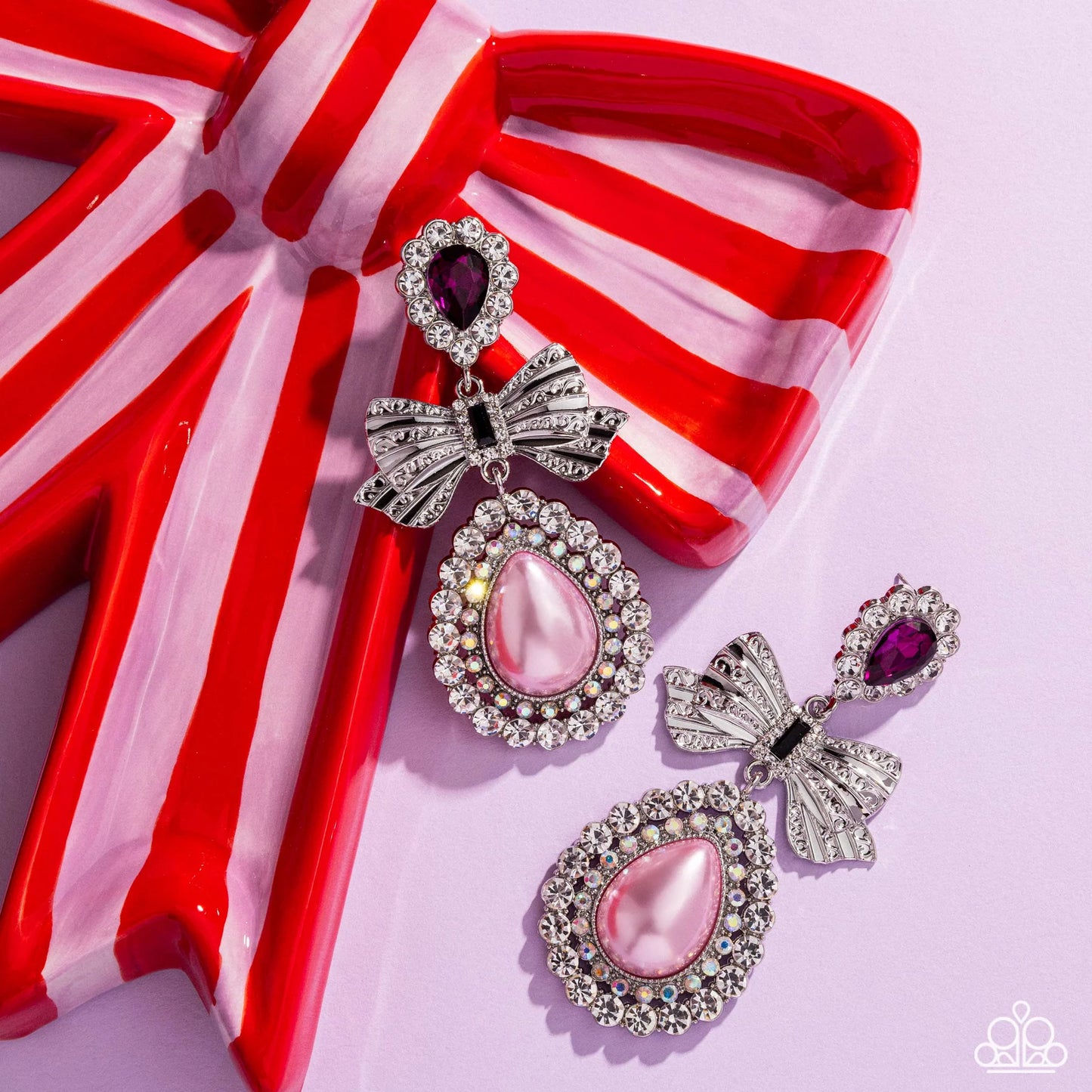 Paparazzi Alluring Aesthetic - Multi Pink Iridescent Rhinestone Silver Bow Post Earrings Life Of The Party February 2025 E2731