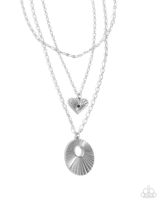 Sunburst Stage - Silver Layered Chain Sunburst Textured Pendant Necklace Paparazzi N3186