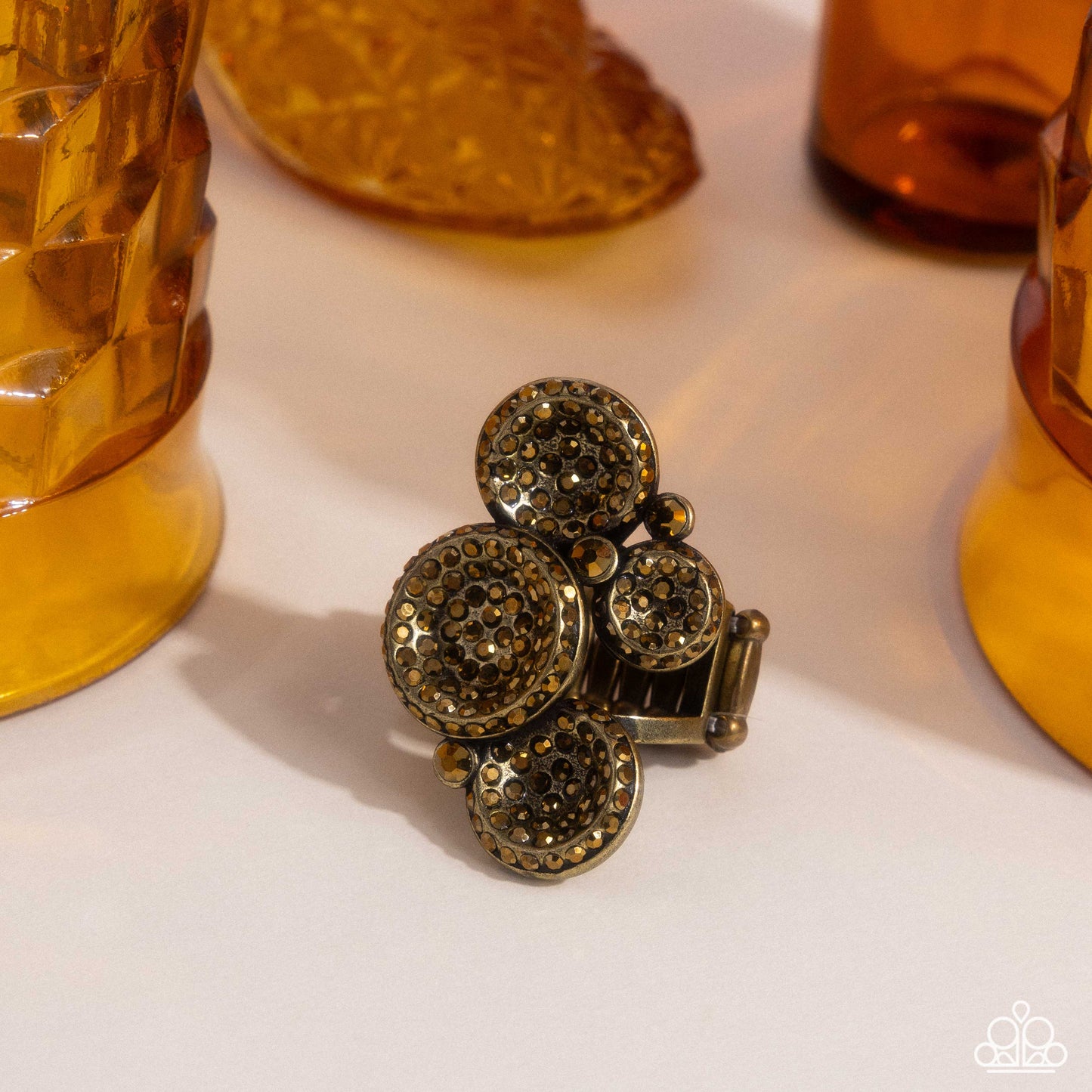 Deluxe Discs - Brass Aurum Rhinestone Ring Paparazzi R1008