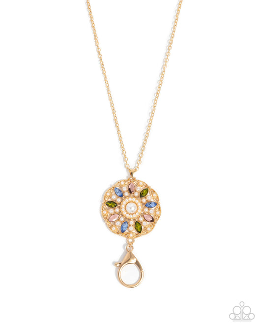 Angelic Arrangement - Gold, White Pearl, Olive, Aurum & Blue Rhinestone Medallion Pendant Lanyard Necklace Paparazzi N2951
