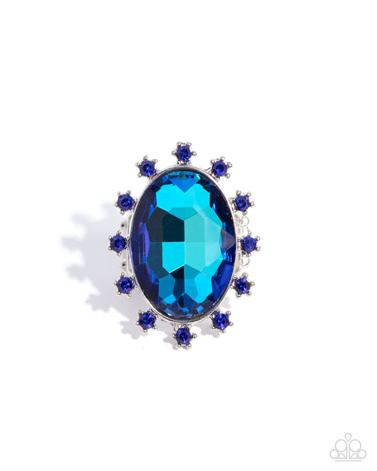 Make a Sound - Blue Sapphire Rhinestones & Blue UV Shimmery Gem Statement Ring Paparazzi R0996