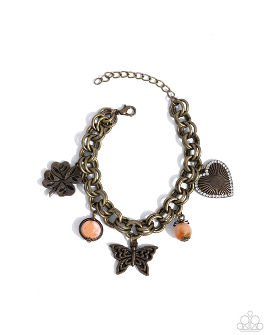Folklore Frenzy - Brass - Antiqued Brass Clover, Butterfly, Heart Charm Style Bracelet Paparazzi B2050