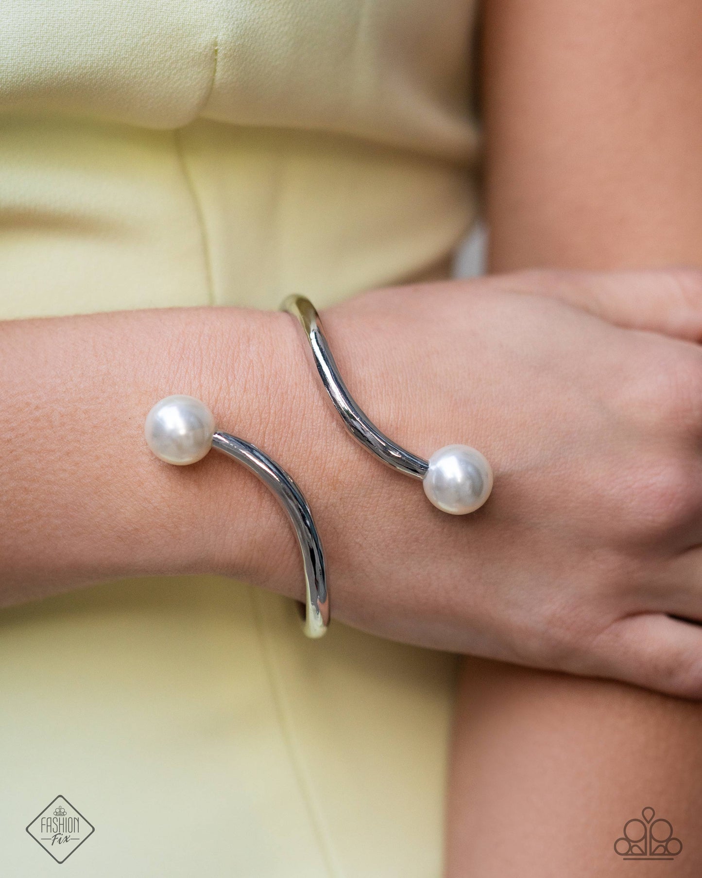 Effulgent Exemplar - White Hinged Bracelet Fiercely 5th Avenue Fashion Fix February 2025 Paparazzi
