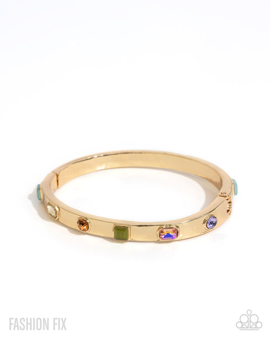 Proper Poise - Multicolored Gem, Rhinestones & Cat's Eye Stone Gold Stretch Bracelet Fiercely 5th Avenue May 2025 Paparazzi B2264