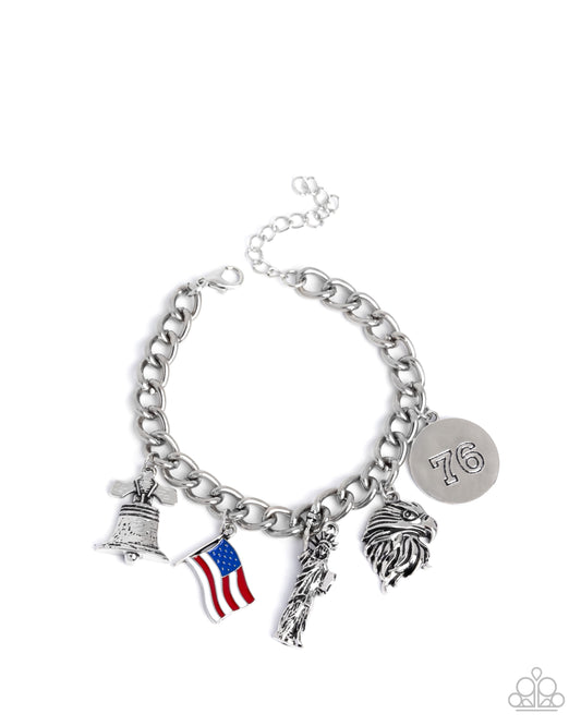Liberty Legacy - Red, White & Blue Americal Flag, Silver Liberty Bell, Americal Flag, Liberty Statue, Eagle Patriotic Charm Style Bracelet Paparazzi B2294