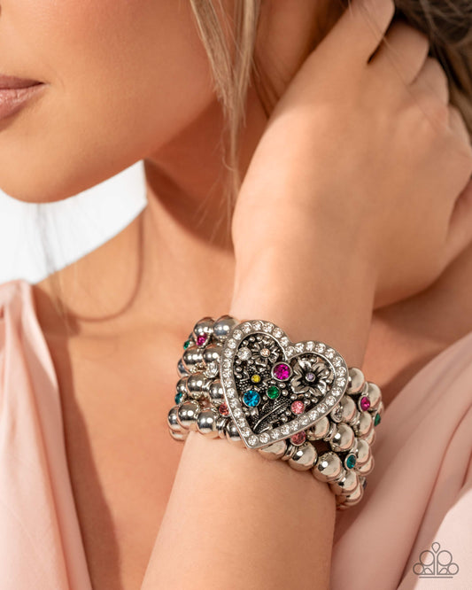 Personal History - Multicolored Rhinestone Filigree Heart Bracelet April 2025 Life Of The Party Paparazzi B2051