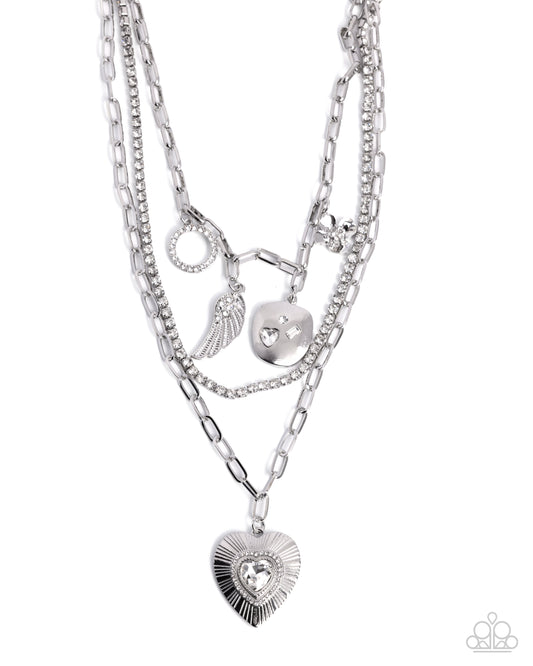 Angelic Ambition - White Rhinestone Silver Heart Pendant Layered Charm Style Necklace Angel Wing, Ring, Flower Paparazzi N3270