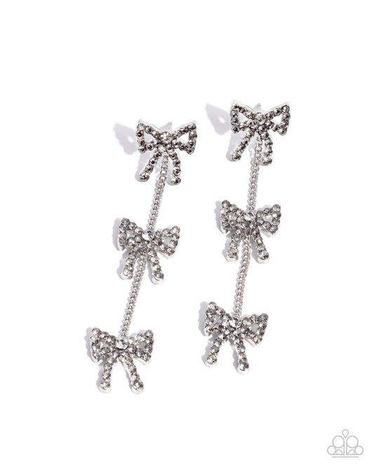 Paparazzi Coquette Course - Silver Rhinestone Bow Earrings E3397