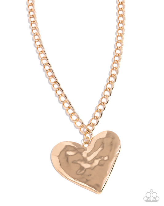 Paparazzi Hammered Heartthrob - Gold Hammered Heart Statement Necklace