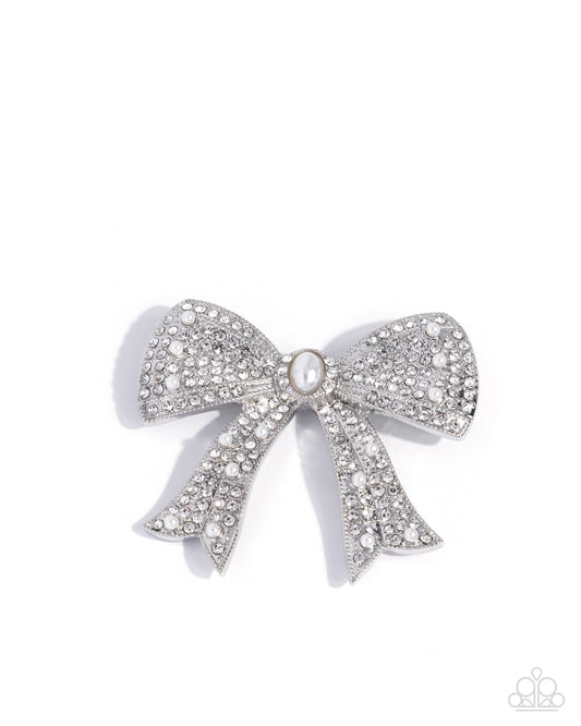 Paparazzi Bow Bravado - White Rhinestone Bow Lapel Pin Brooch Paparazzi
