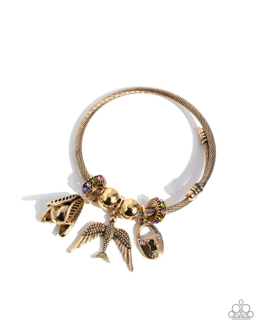 Malibu Meeting - Multi Color Rhinestone Gold Bird Lock Charm Bangle Bracelet March 2025 Life of the Party Paparazzi B2011