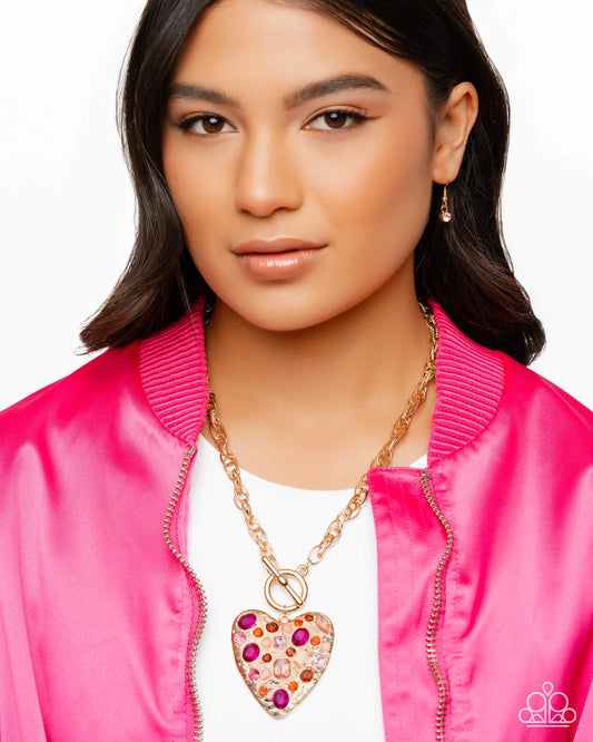 Paparazzi Circulated Chic - Pink Gems Gold Heart Toggle Style Necklace June 2026 Life of the Party