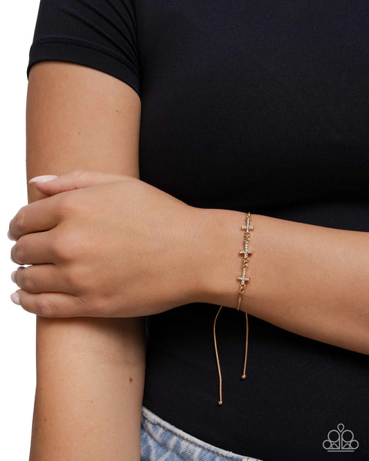 Holy Order - Gold & White Rhinestone Cross Sliding Bead Closure Bracelet Paparazzi B2297