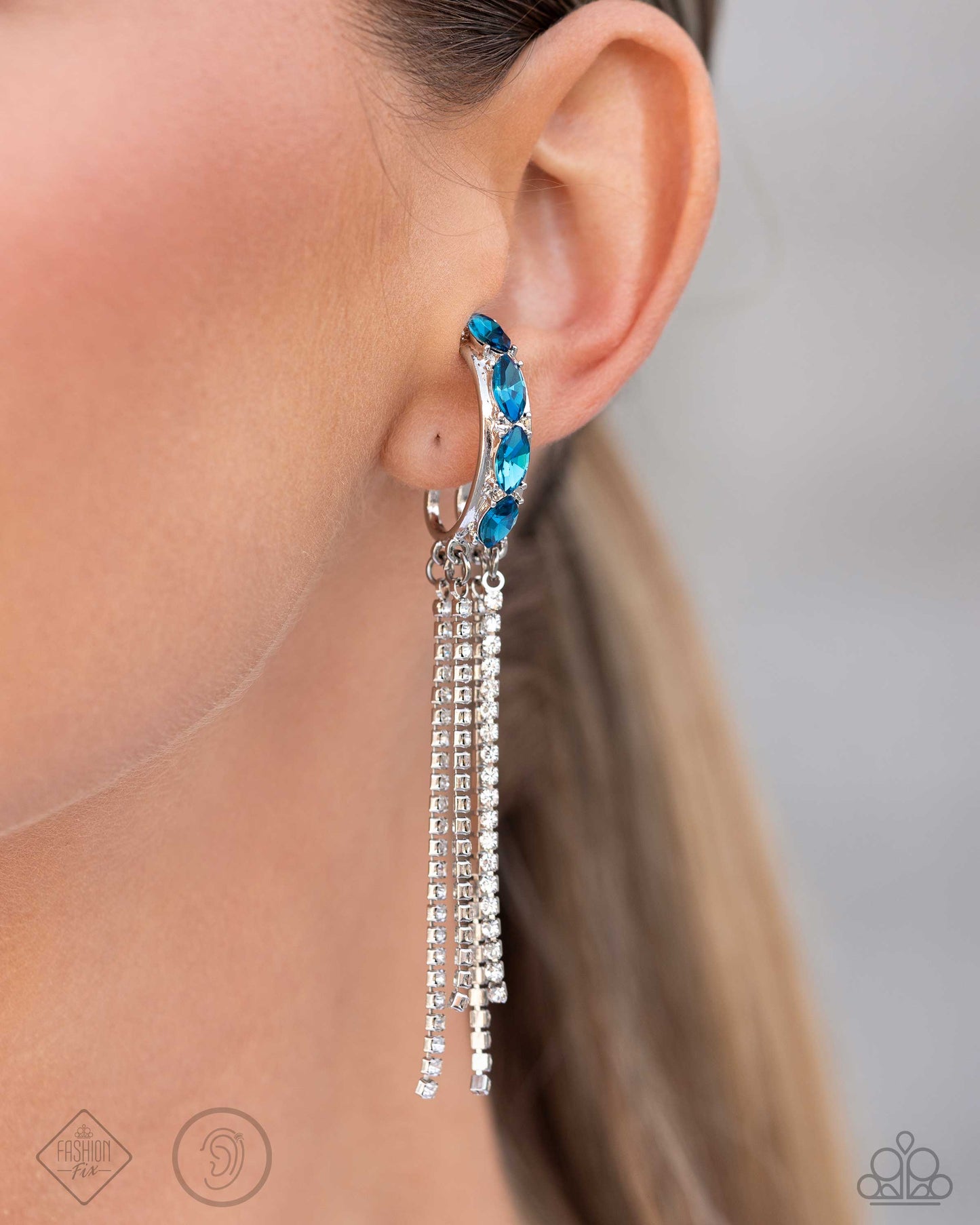 Feminine Fascination - Blue Gem & White Rhinestone Ear Cuff Fashion Fix Fiercely 5th Avenue July 2024 Paparazzi