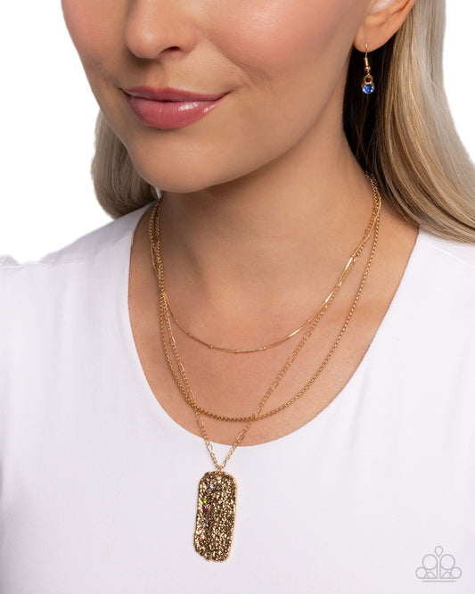 Spellbound Story - Multicolored, Iridescent Rhinestone Gold Abstract Pendant Necklace Paparazzi N3392
