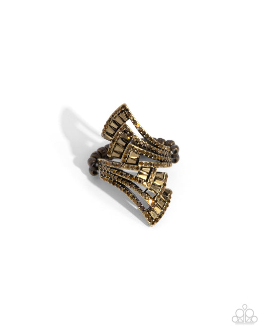 Motivated Musings - Brass Aurum Rhinestone Wing Like Ring Paparazzi