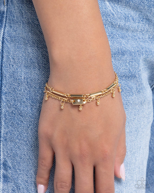 Radiant Recognition - Gold, White Rhinestone, Snake Chain Bracelet Paparazzi B1953