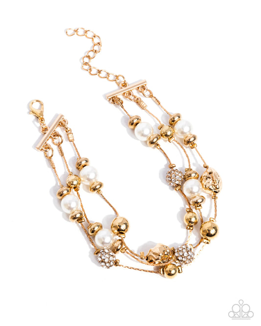 Classy Cruise - Gold, White Rhinestone & Pearl Multi Strand Bracelet Paparazzi B2349