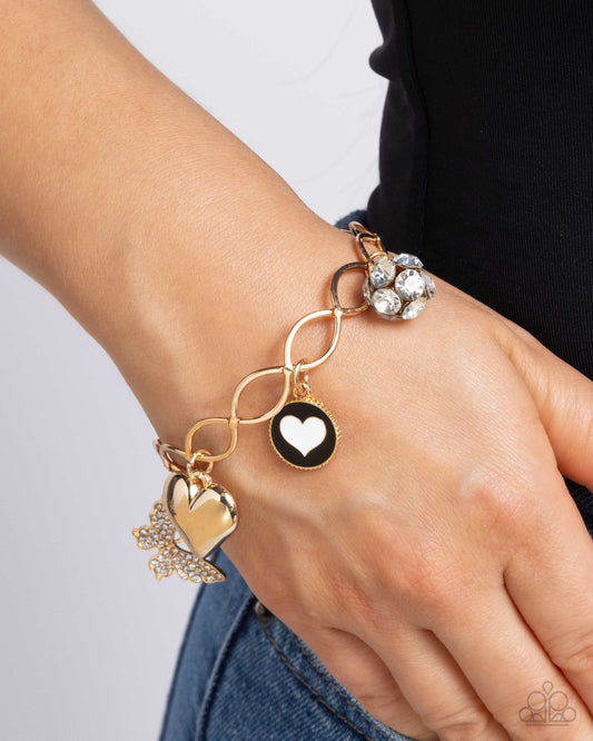 Lullaby Lucky - Gold White Heart, Gold Heart, Gold Butterfly & Black Crown Charm Style Bracelet Paparazzi B2217
