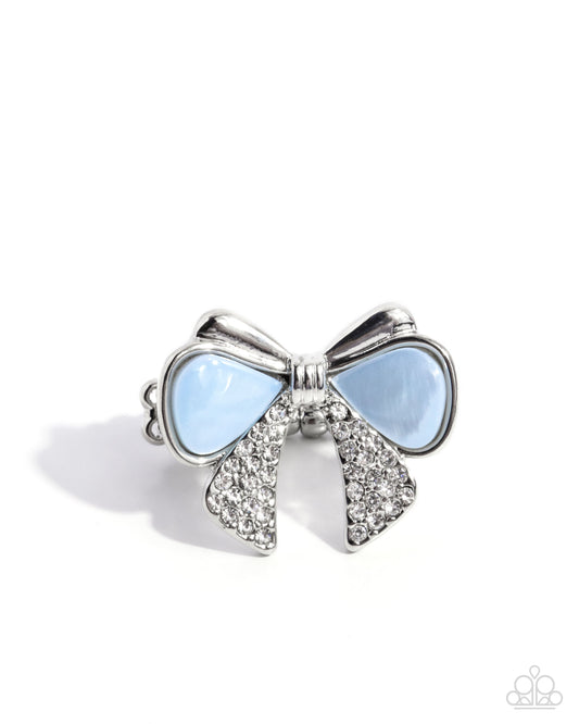 Classy Coquette - Blue Winter Sky Shell & White Rhinestone Bow Ring Paparazzi R0948