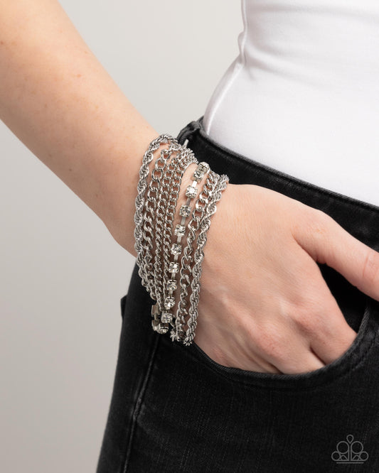 Executive Extravagance - White Rhinestone & Silver Multi Chain Bracelet Paparazzi B1958