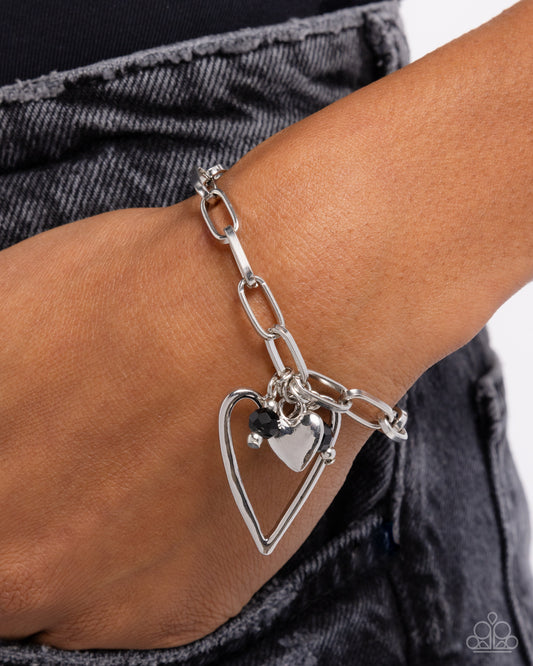 Emotional Eloquence - Black Faceted Bead Silver Heart Charm Bracelet Paparazzi