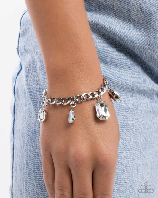 Driving Dazzle - White & Iridescent Gem Silver Bracelet Paparazzi