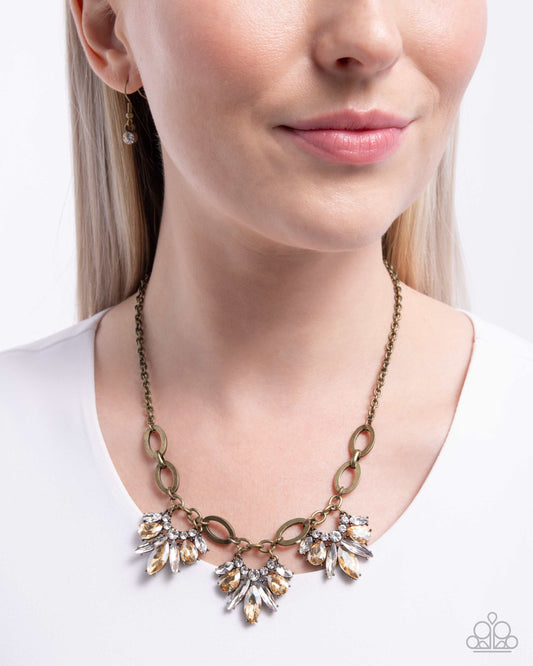 Professional Powerhouse - Brass White, Champagne Gem Necklace Paparazzi N2939