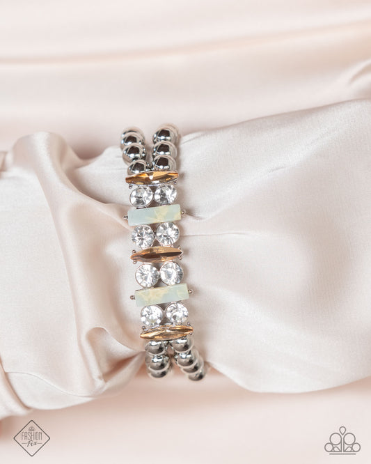Splendid Shimmer - Multi White Rhinestone, Champagne & Milky Blue Gem Stretch Bracelet Fierely 5th Avenue Fashion Fix January 2025 Paparazzi B2205