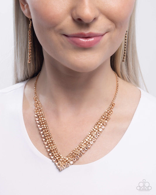 Paparazzi Pointed Pizzazz - Gold & Light Peach Rhinestone Necklace