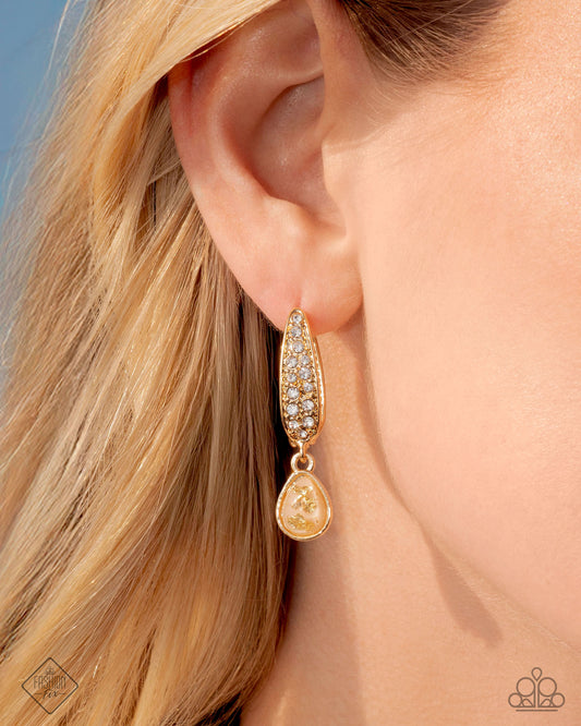 Cheerful Care - Gold Champagne Cat's Eye & White Rhinestone Glimpses Of Malibu Fashion Fix April 2025 Paparazzi