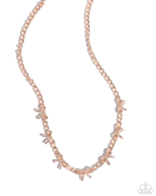 BOW the Knee - Rose Gold Bow Charm Style Necklace Paparazzi N3182