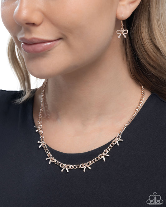 BOW the Knee - Rose Gold Bow Charm Style Necklace Paparazzi N3182