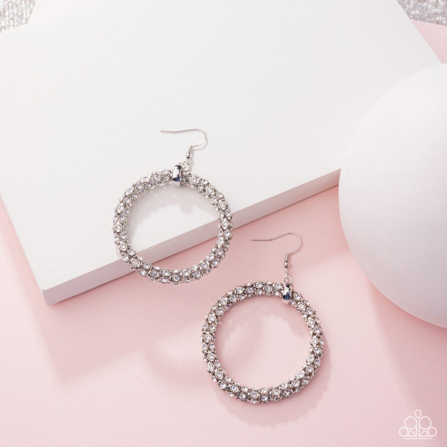 Breathtaking Beacon - White Rhinestone Glittery Hoop Earring April 2025 Life Of The Party Paparazzi E2708