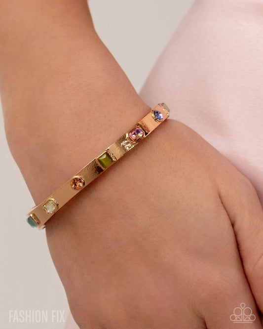 Proper Poise - Multicolored Gem, Rhinestones & Cat's Eye Stone Gold Stretch Bracelet Fiercely 5th Avenue May 2025 Paparazzi B2264