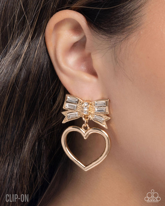 Matchmaking Model - Gold Bow, Heart & White Gem Clip On Earring Paparazzi E2900