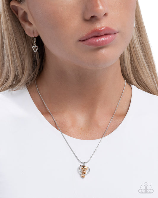 Delightful Dog - Silver Heart & Gold Dog Charm Necklace Paparazzi