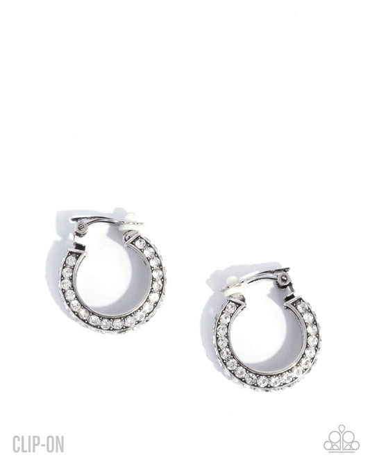 Paparazzi Date Night Debut - White Rhinestone Silver Hoop Clip-On Earring E2340
