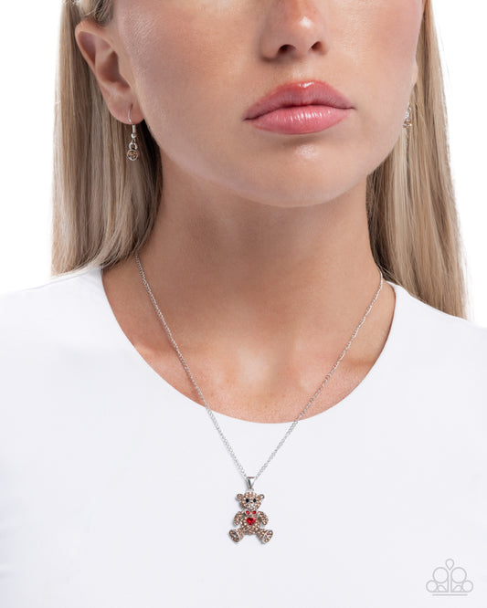 Twinkling Teddy - Multi Brown Light Topaz Rhinestone & Red Rhinestone Heart Teddy Bear Necklace Paparazzi N3498